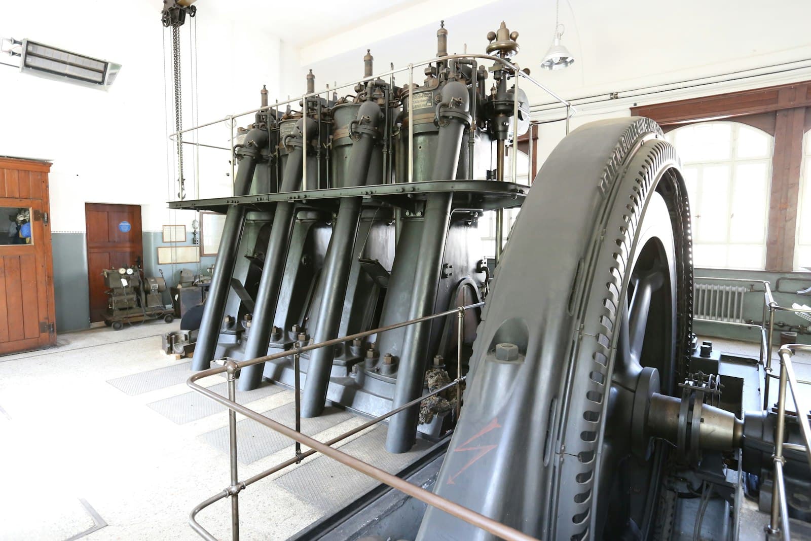 Large stationary engine in a power house.