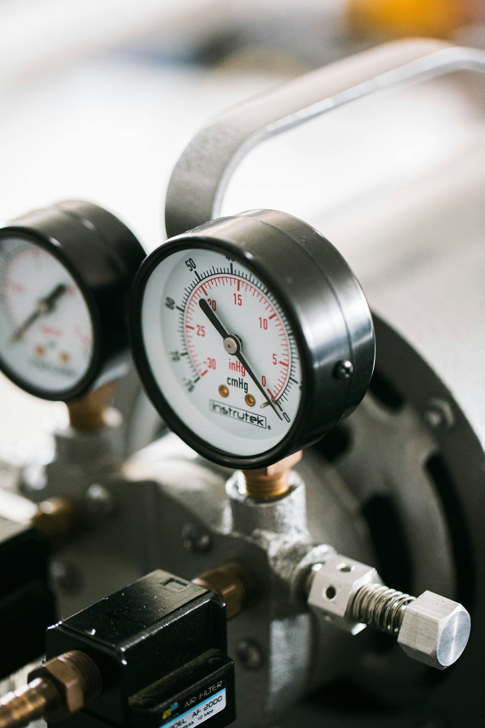 Pressure gauges on machinery.