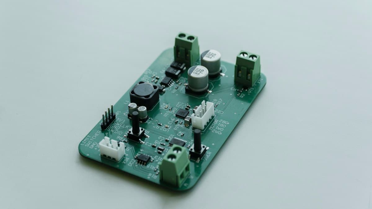 Control circuit board with terminals and components.